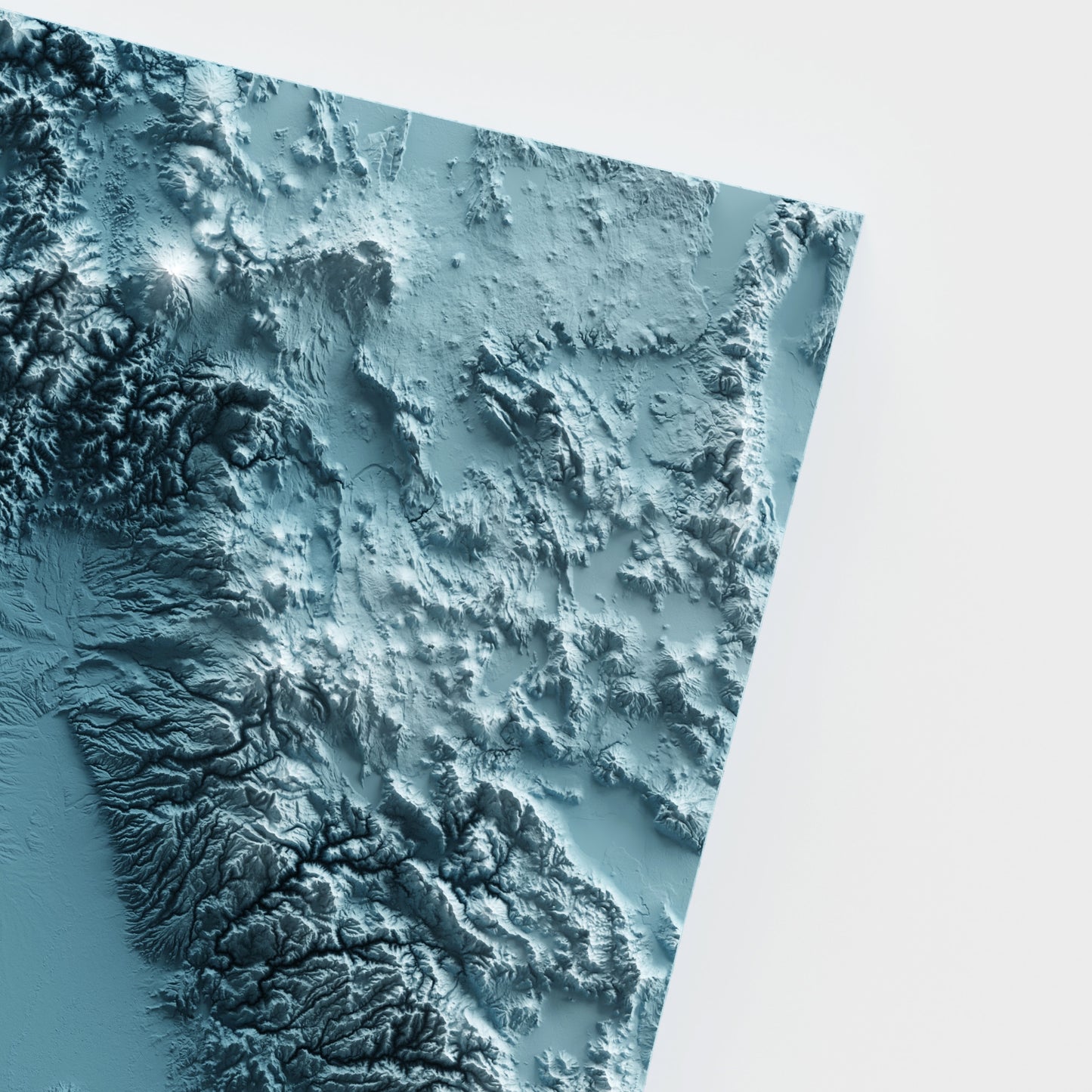 A minimalist relief map of the US State of California in frame made out of pine wood. Topographic map poster for travel and geography fans.