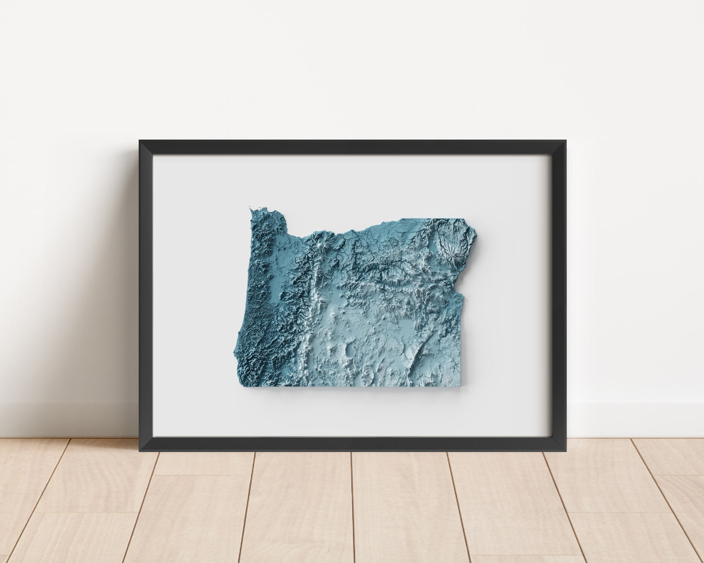 A minimalist relief map of the US State of Oregon in frame made out of pine wood. Topographic map poster for travel and geography fans.