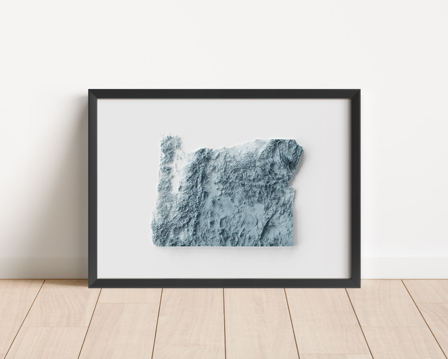 A minimalist relief map of the US State of Oregon in frame made out of pine wood. Topographic map poster for travel and geography fans.