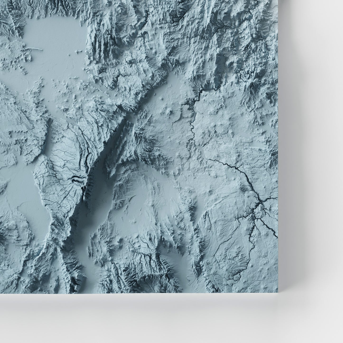 A minimalist relief map of the US State of Oregon in frame made out of pine wood. Topographic map poster for travel and geography fans.