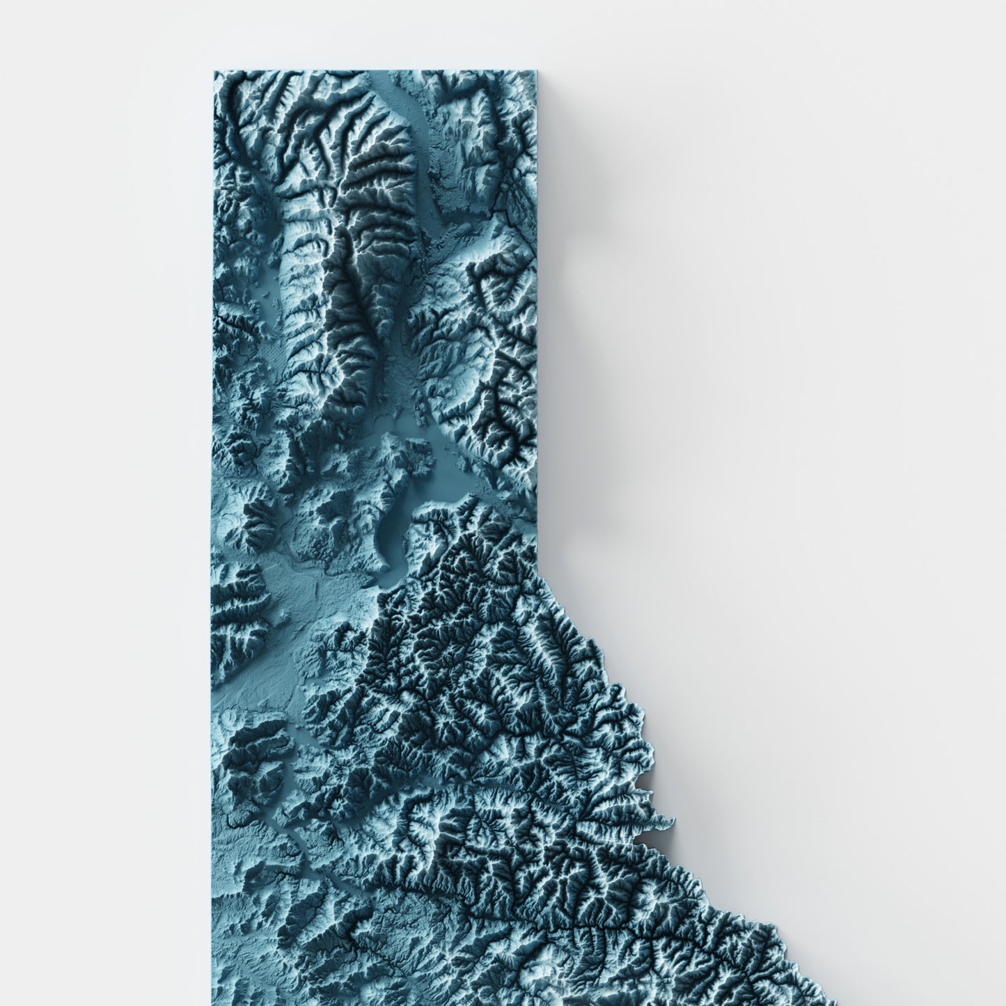 A minimalist relief map of the US State of Idaho in frame made out of pine wood. Topographic map poster for travel and geography fans.