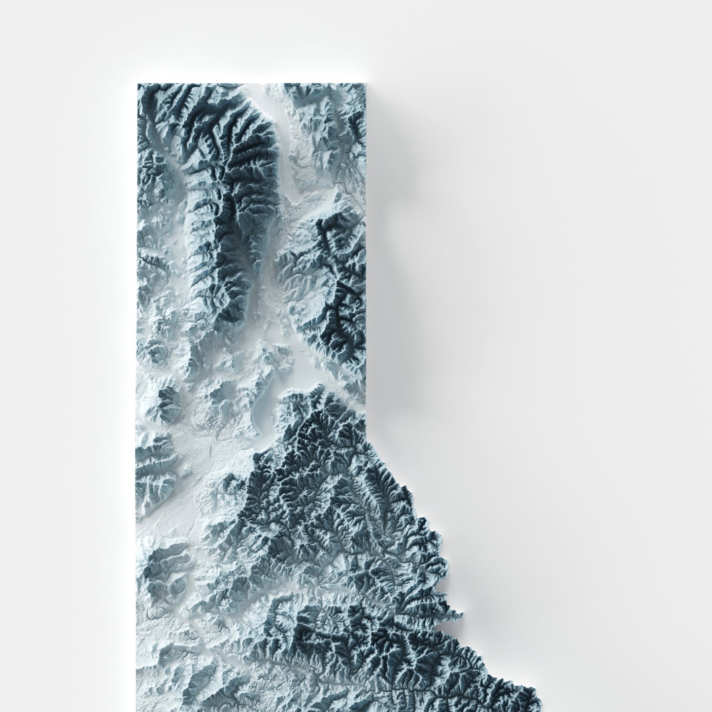 A minimalist relief map of the US State of Idaho in frame made out of pine wood. Topographic map poster for travel and geography fans.
