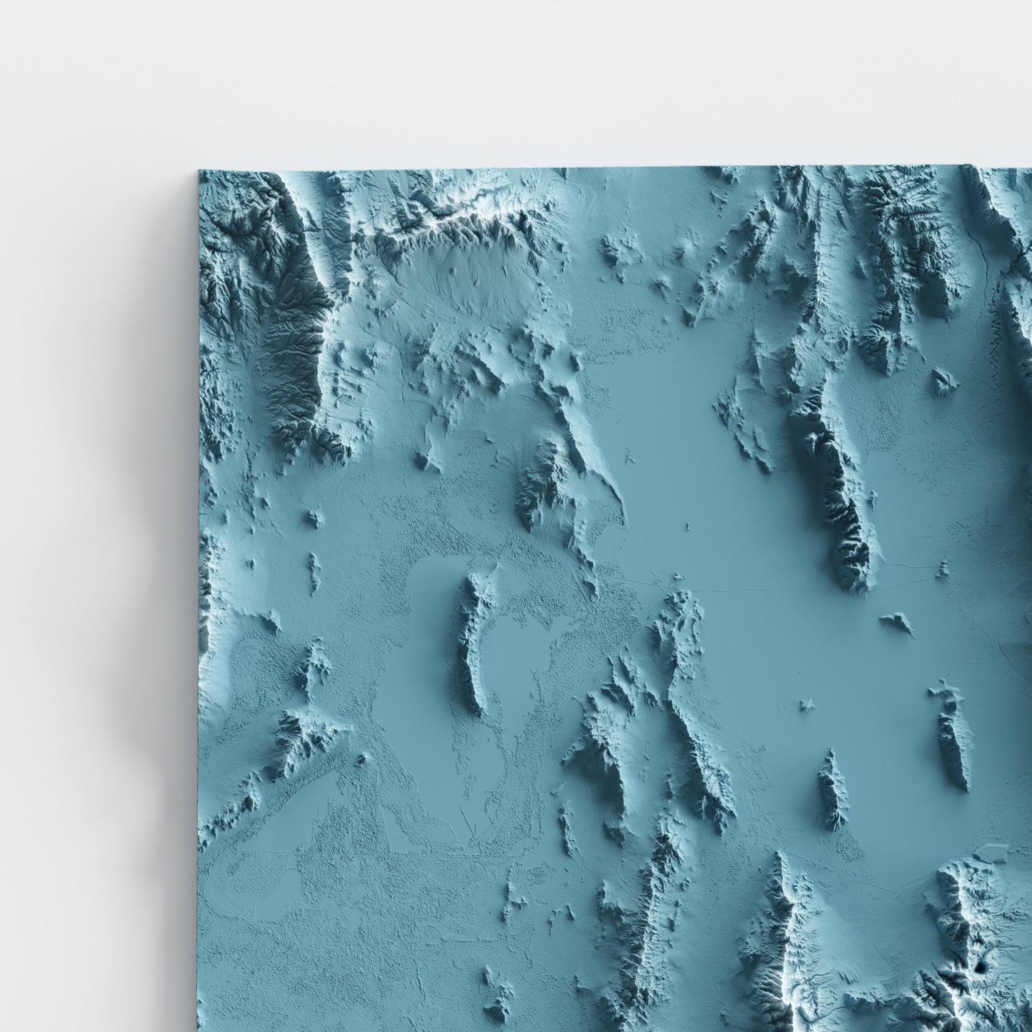 A minimalist relief map of the US State of Utah in frame made out of pine wood. Topographic map poster for travel and geography fans.