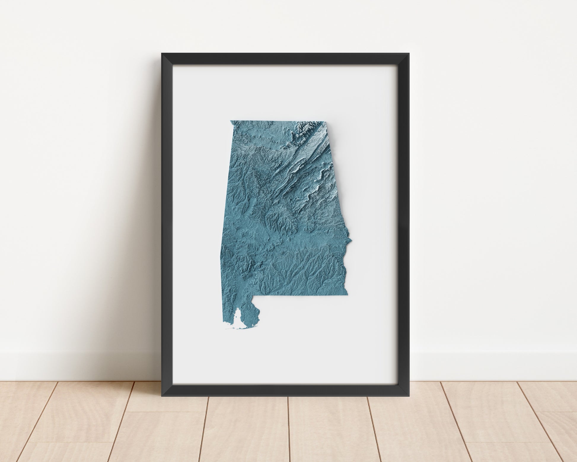 A minimalist relief map of the US State of Alabama in frame made out of pine wood. Topographic map poster for travel and geography fans.