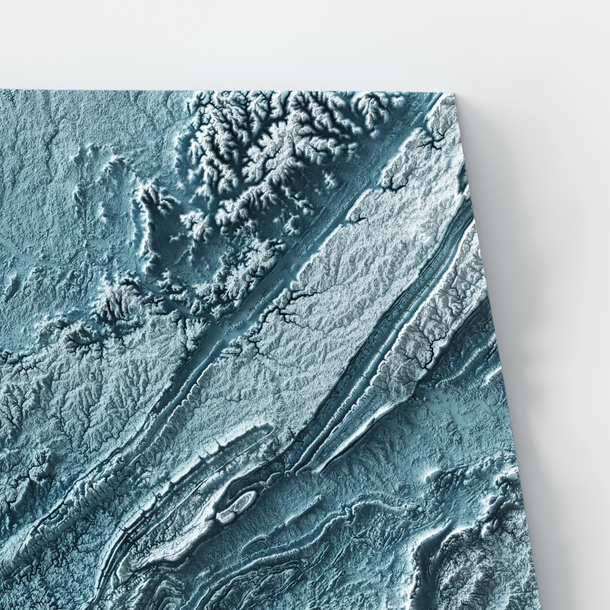 A minimalist relief map of the US State of Alabama in frame made out of pine wood. Topographic map poster for travel and geography fans.