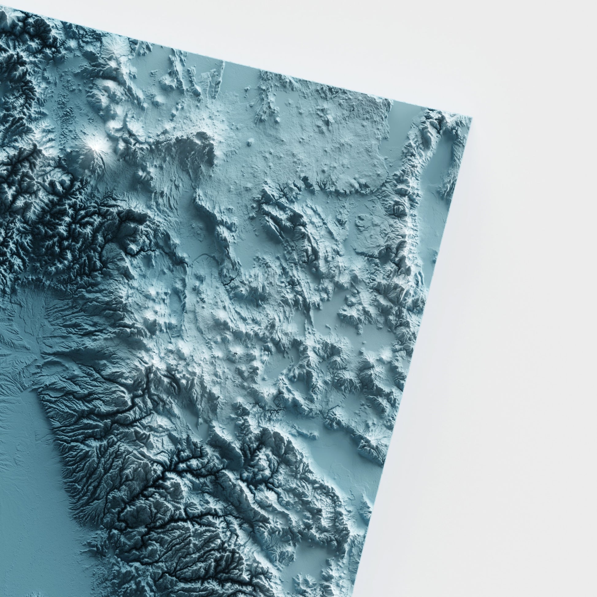 A minimalist relief map of the US State of California in frame made out of pine wood. Topographic map poster for travel and geography fans.