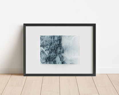 A minimalist relief map of the US State of Colorado in frame made out of pine wood. Topographic map poster for travel and geography fans.
