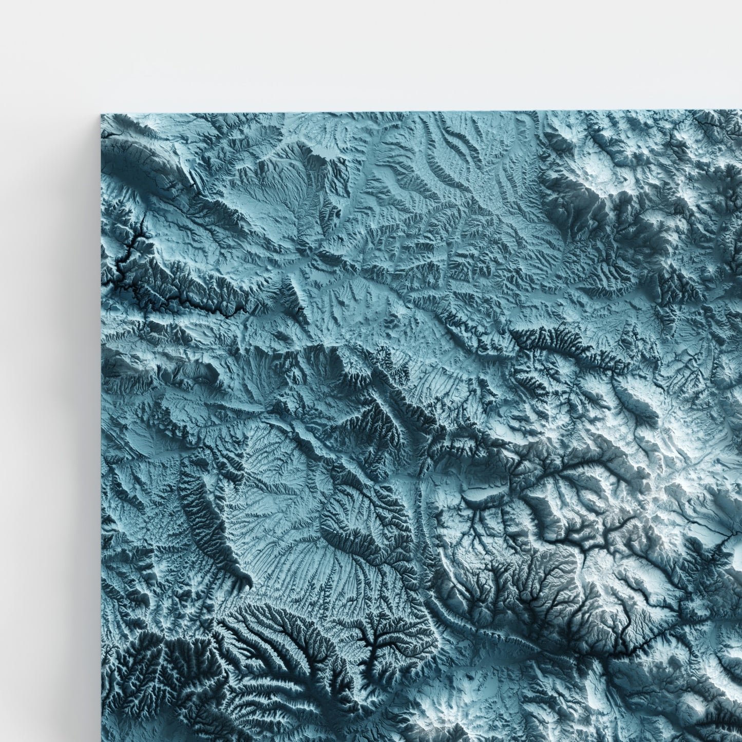 A minimalist relief map of the US State of Colorado in frame made out of pine wood. Topographic map poster for travel and geography fans.
