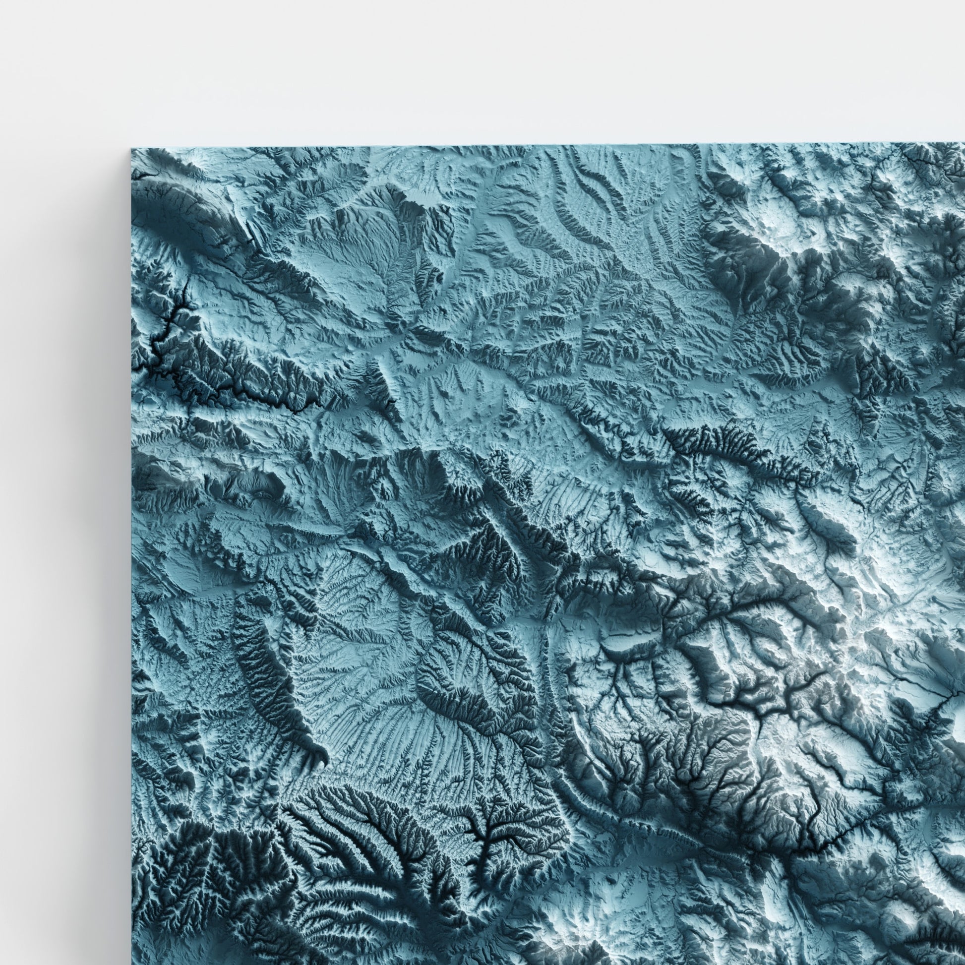 A minimalist relief map of the US State of Colorado in frame made out of pine wood. Topographic map poster for travel and geography fans.