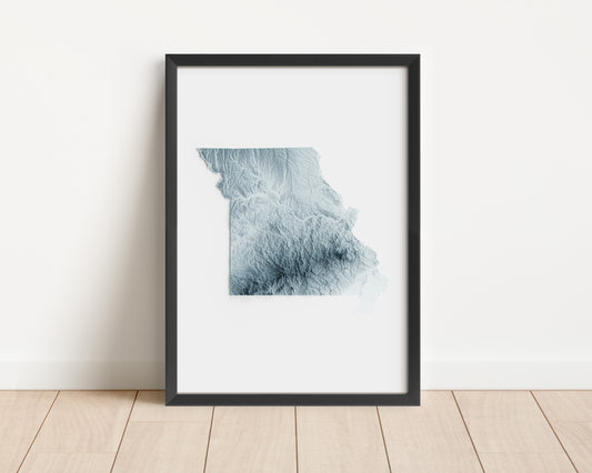 A minimalist relief map of the US State of Missouri in a frame made out of pine wood. Topographic map poster for travel and geography fans.
