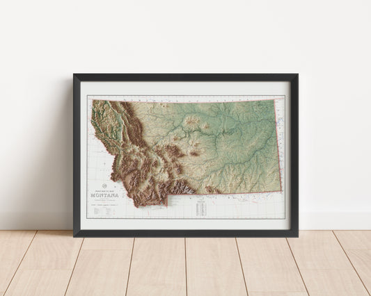A framed elevation map of the US State of Montana in a frame made out of pine wood. This elevation map is a reproduction of the 1951 post route map of the US State of Montana and has been carefully restored by us.