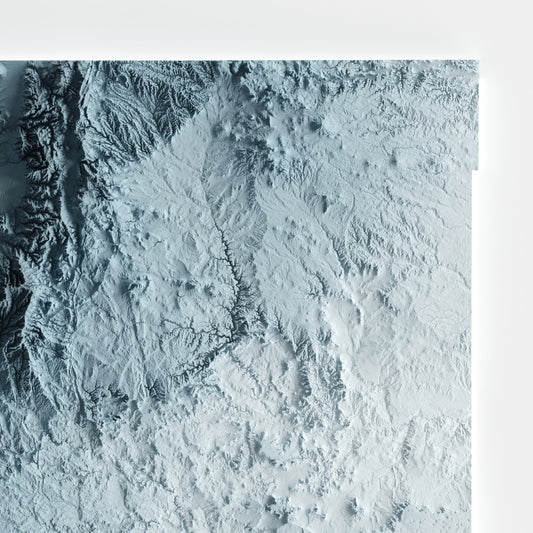A minimalist relief map of the US State of New Mexico in frame made out of pine wood. Topographic map poster for travel and geography fans.