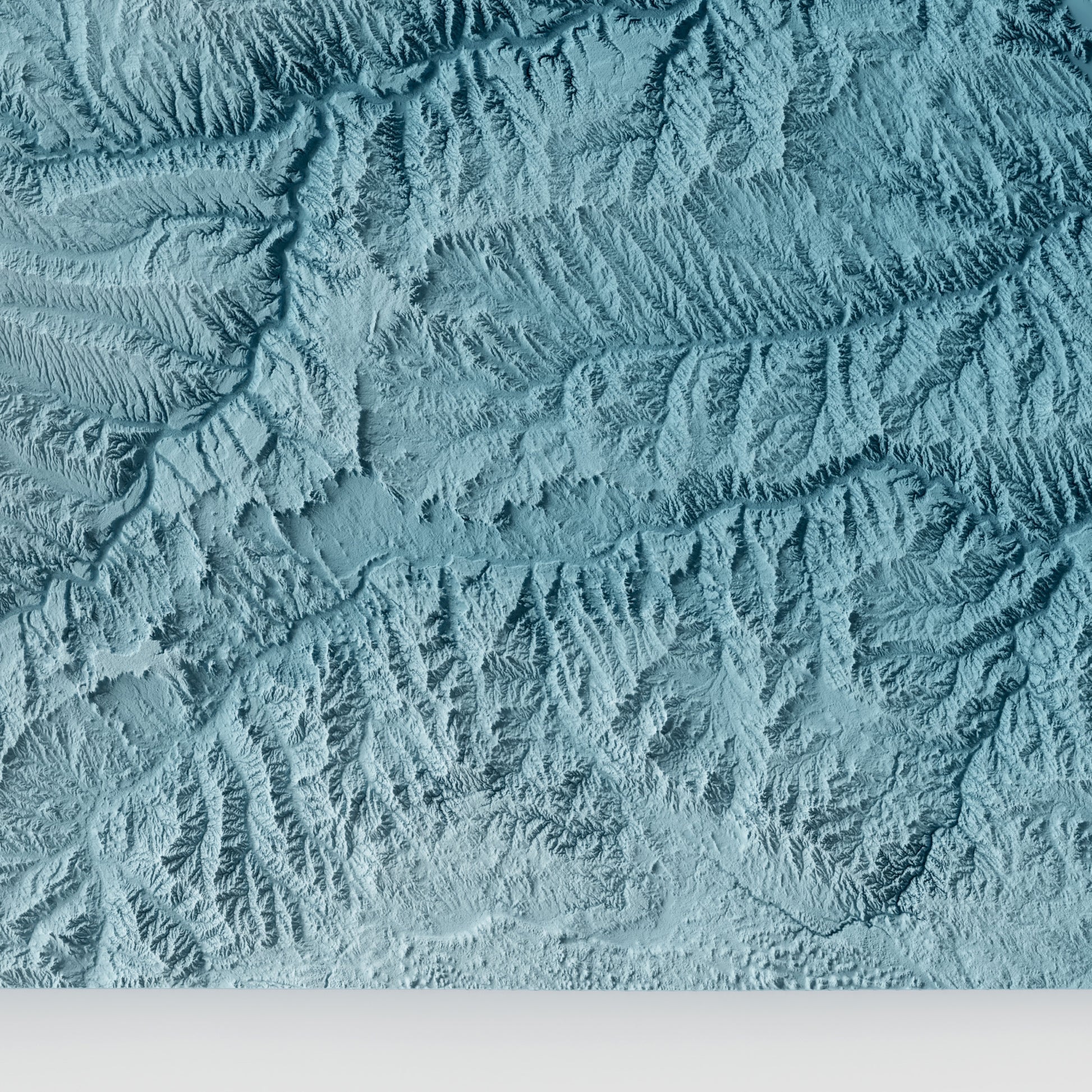 A minimalist relief map of the US State of South Dakota in a frame made out of pine wood. Topographic map poster for travel and geography fans.