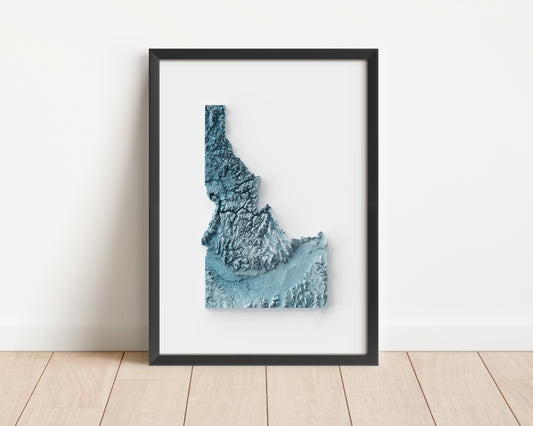 A minimalist relief map of the US State of Idaho in frame made out of pine wood. Topographic map poster for travel and geography fans.