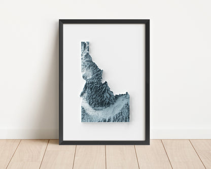 A minimalist relief map of the US State of Idaho in frame made out of pine wood. Topographic map poster for travel and geography fans.