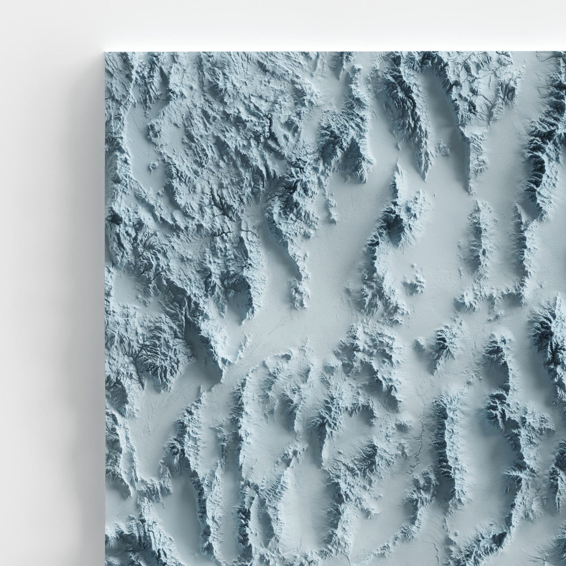 A minimalist relief map of the US State of Nevada in frame made out of pine wood. Topographic map poster for travel and geography fans.
