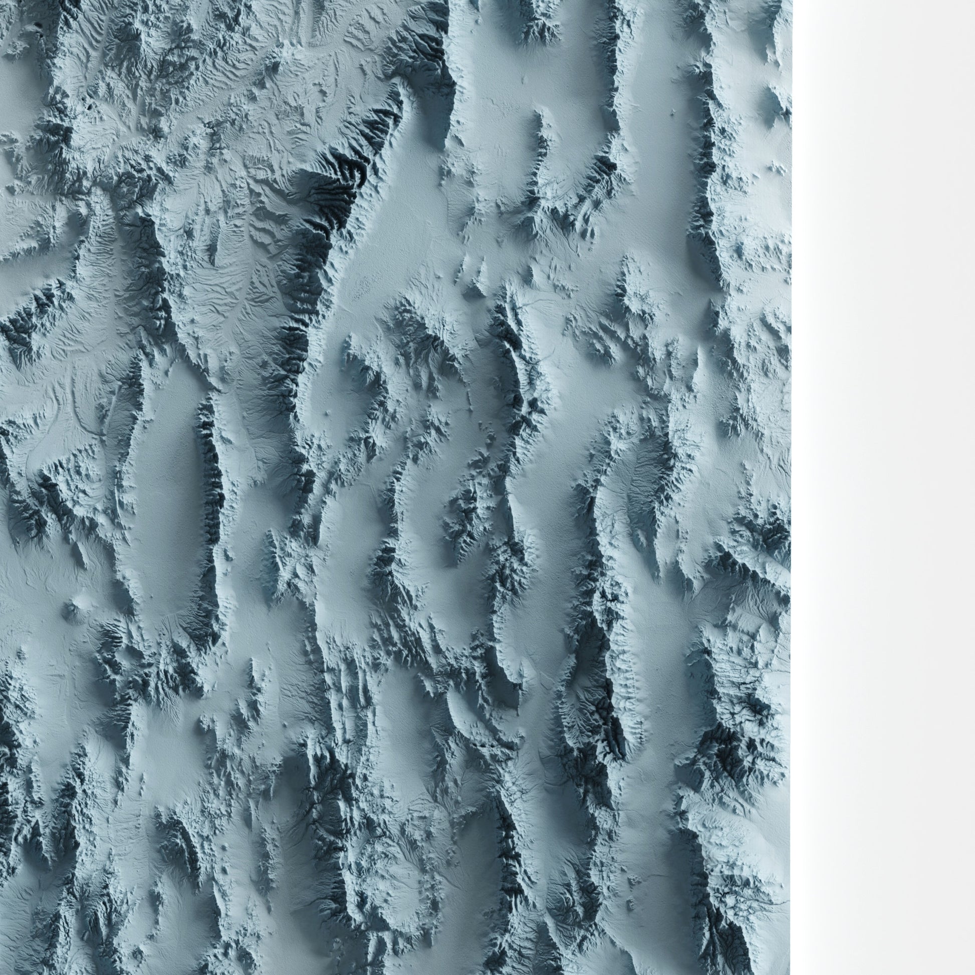 A minimalist relief map of the US State of Nevada in frame made out of pine wood. Topographic map poster for travel and geography fans.