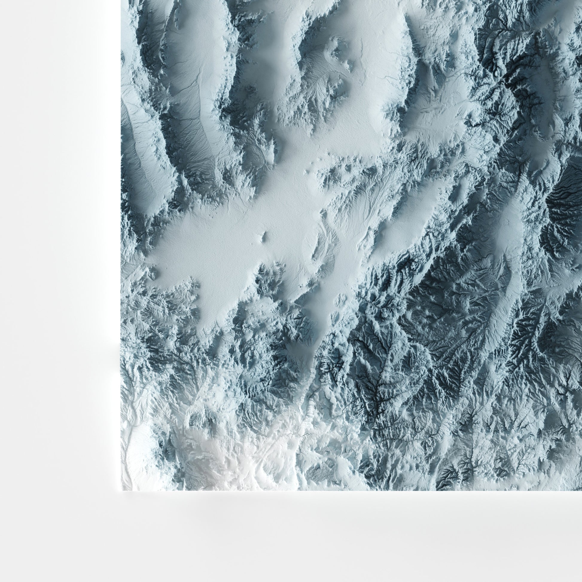 A minimalist relief map of the US State of Utah in frame made out of pine wood. Topographic map poster for travel and geography fans.