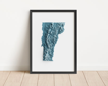 A minimalist relief map of the US State of Vermont in frame made out of pine wood. Topographic map poster for travel and geography fans.