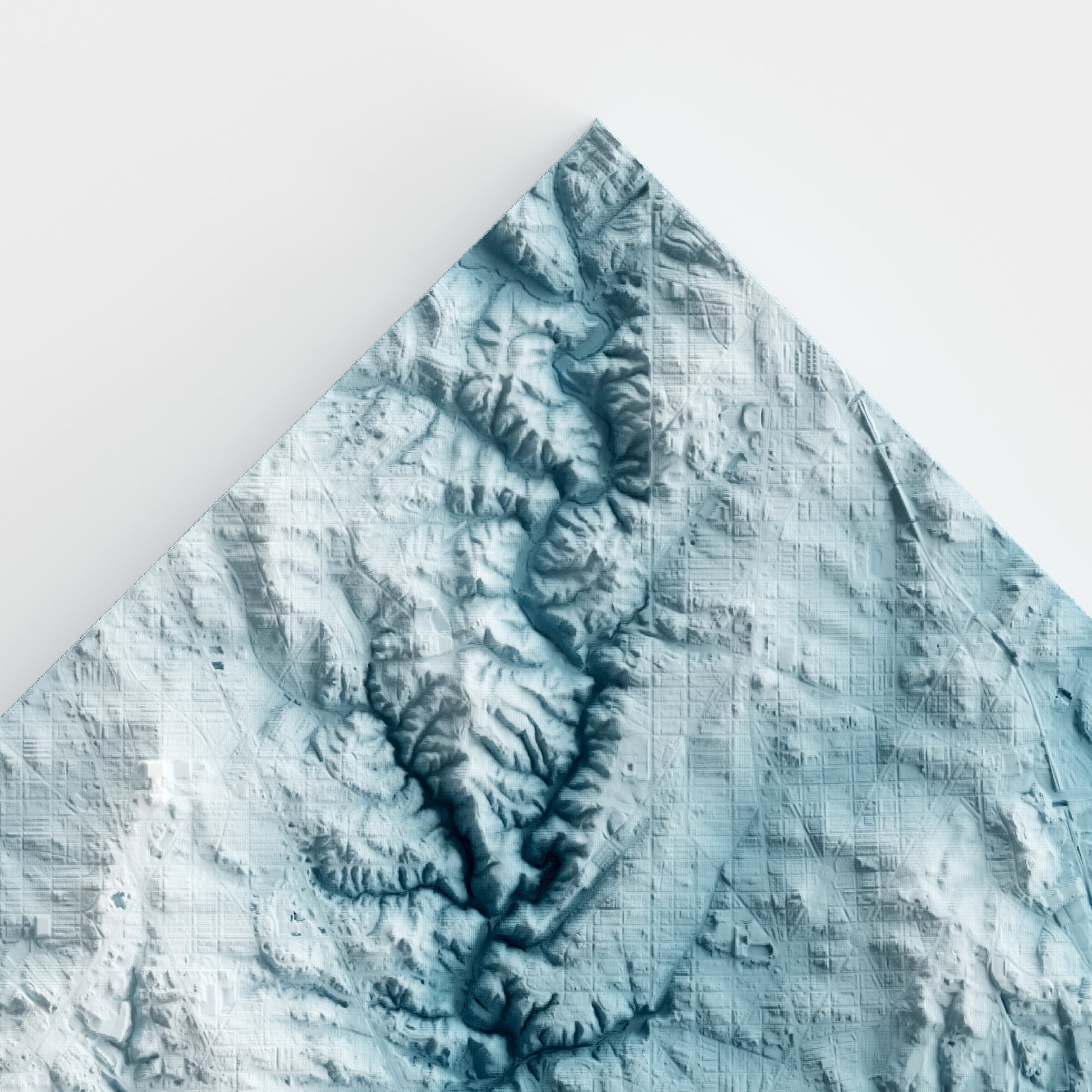 A minimalist relief map of the United States' capital Washington DC in a frame made out of pine wood. Topographic map poster for travel and geography fans.