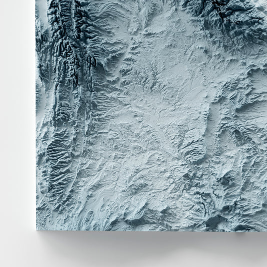 A minimalist relief map of the US State of Wyoming in a frame made out of pine wood. Topographic map poster for travel and geography fans.